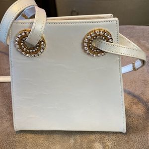 Beautiful  white rhinestone embellished purse. By Leatherock.